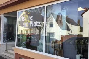 Fris&ouml;re am Platz