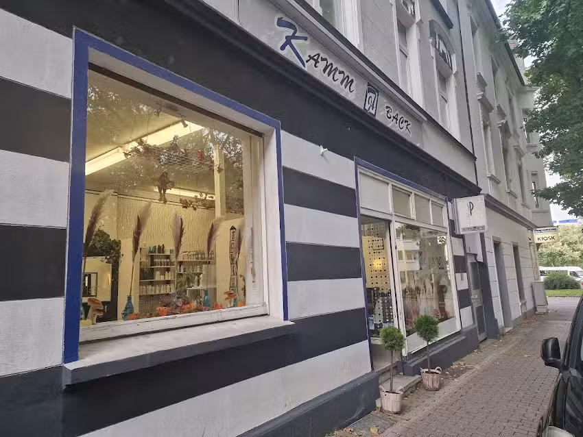 J&uuml;rgen Tauber Friseurgesch&auml;ft Kamm Back